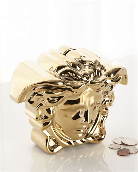 versace coin bank|versace break the bank gold.